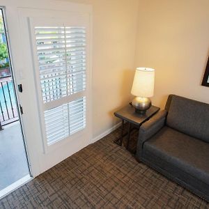 One-Bedroom Suite Two Double Beds Pool View